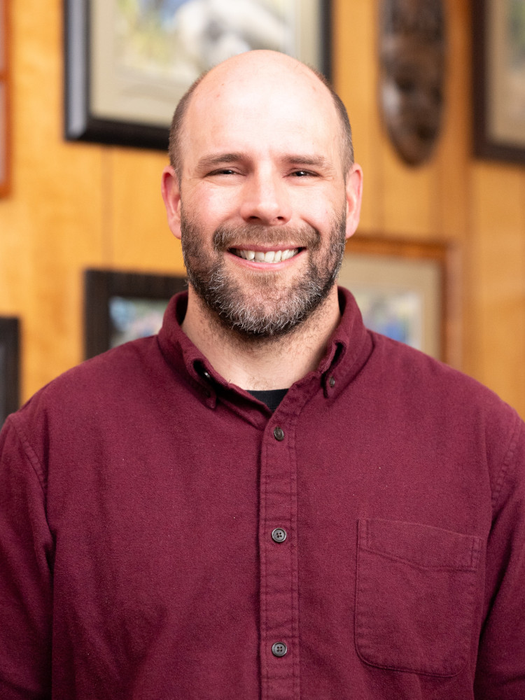 Man smiling at camera.